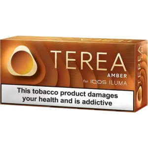 Orange TEREA Amber IQOS ILUMA tobacco packaging with a prominent health-warning banner stating 'This tobacco product damages your health and is addictive'